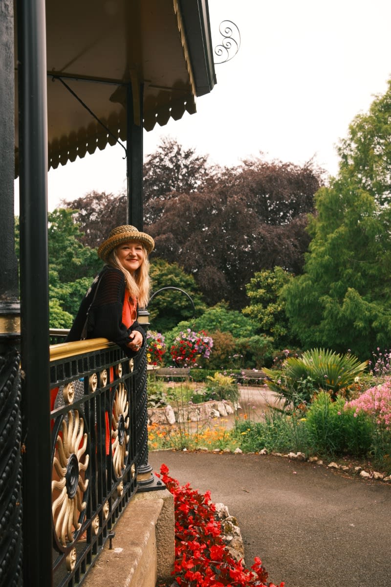 Lisa from Cornwall Pride smiling from the pavilion in a Cornwall park