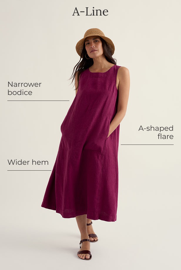 A model wears a dark pink A-line dress against a plain background