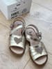 kmins Leder-Sandalen in Gold