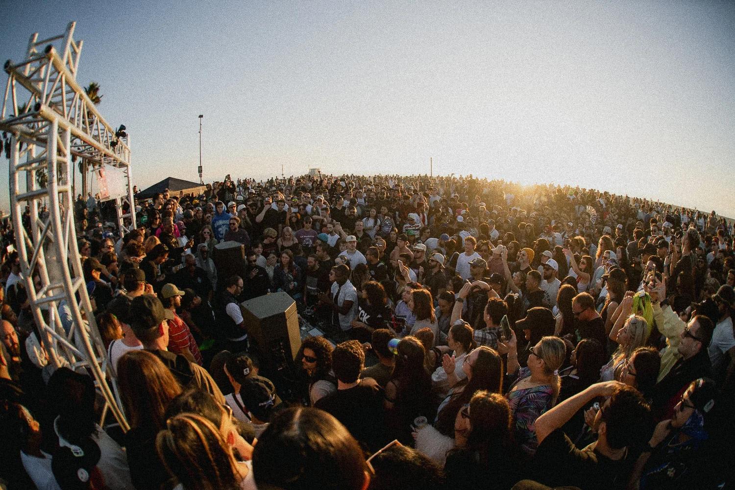 Live event crowd at sunset with CES power setup