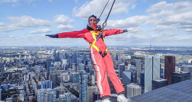 A girl on the edge of the CN Tower