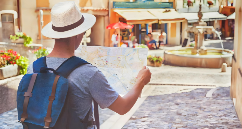 A tourist checking his map