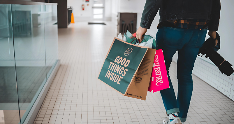 A person holding shopping bags