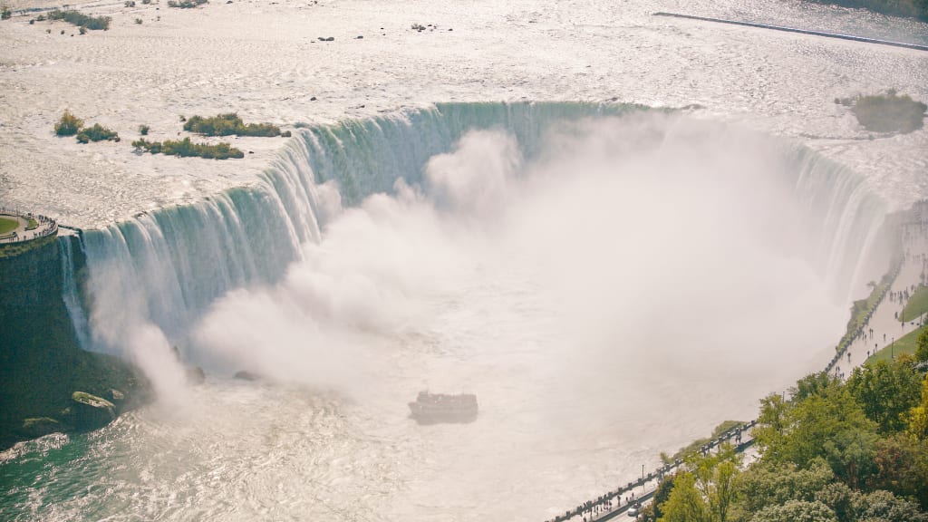 Maid of the mist under the falls Niagara Falls.jpg