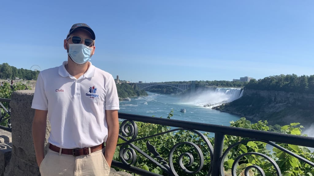 Niagara Falls tour guide wearing mask