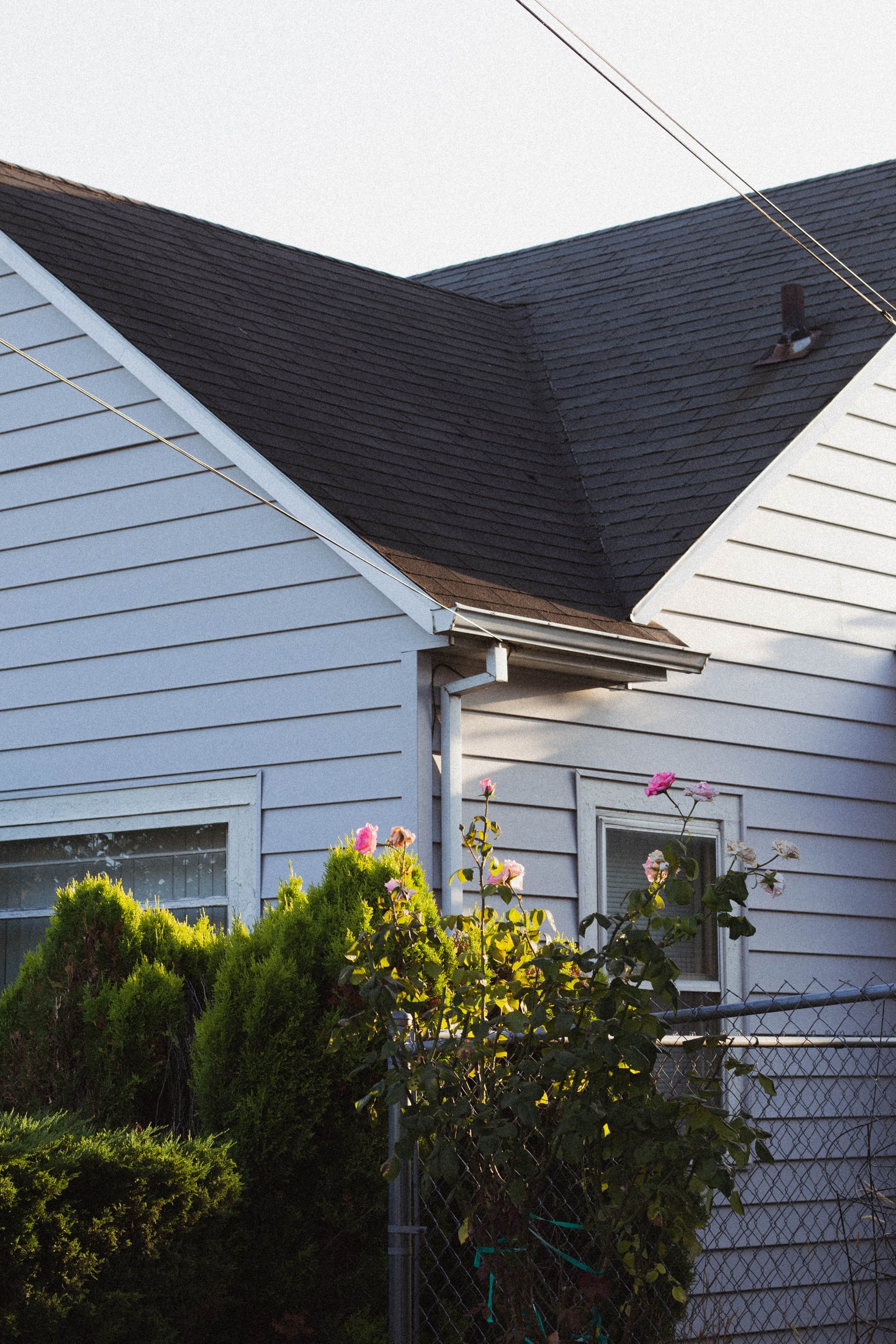 New dark grey roof tiles and gutters