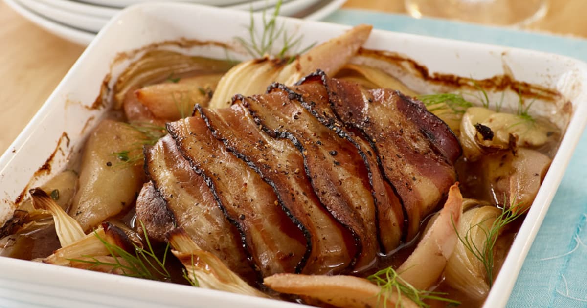 Rôti d'échine de porc au bacon, poire et fenouil - Glouton