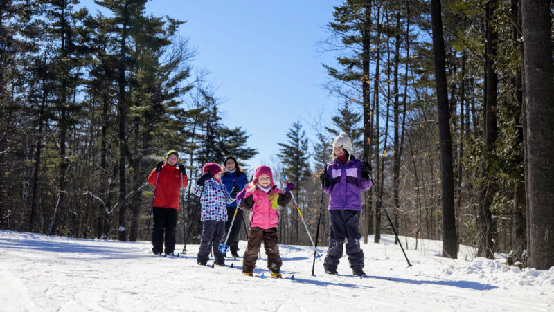 Cross-country skiing child friends