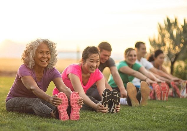 people stretching before exercise