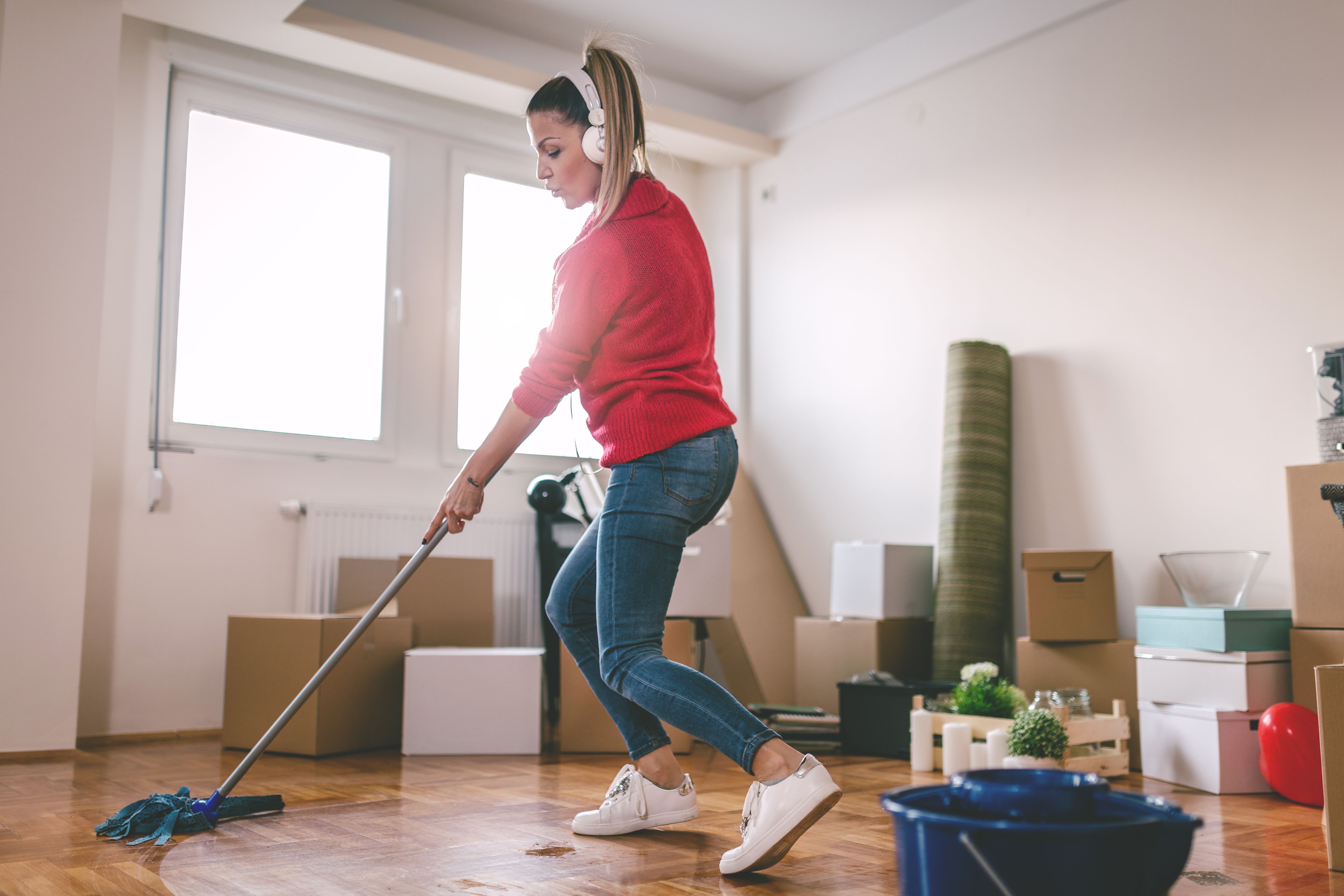 Woman cleaning her house