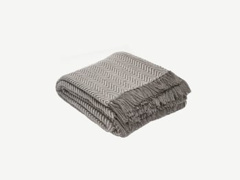 Taupe blanket with a white herringbone pattern.