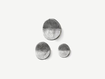 Round cast iron wall hangers.