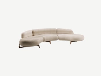 Beige sofa with a curved profile.
