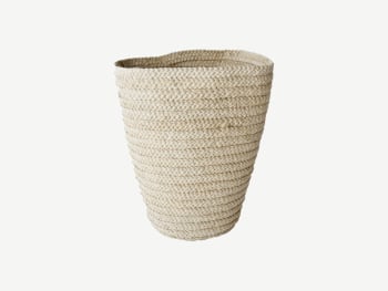Small woven basket finished with white thread.