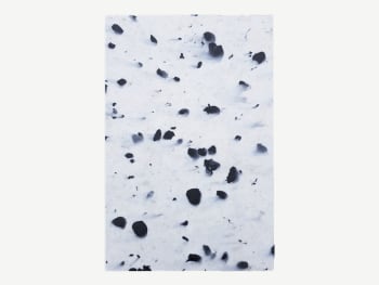 Recycled plastic tile with white background and blue irregular flakes.