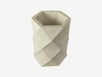 Geometric planter with a folded shape.