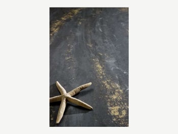Surface finished with charcoal-coloured finish with beige speckles.