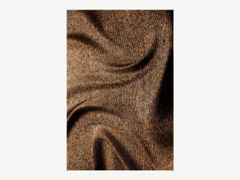 Cork texture with an engraved swirly pattern.