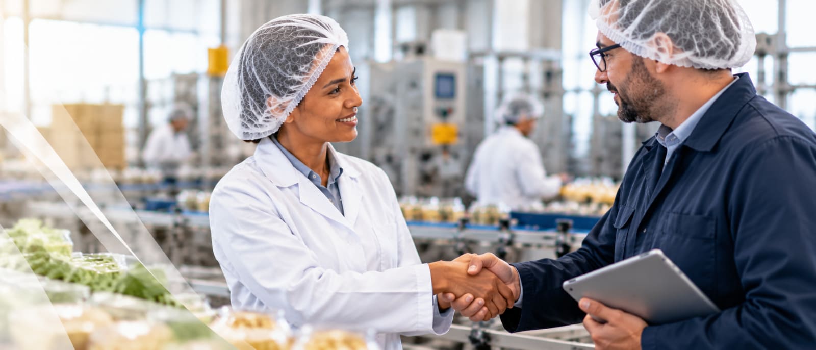 An FSQ Excellence consultant shaking hands with a client on the production floor