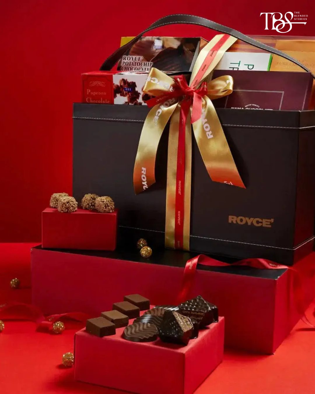 Celebration Basket — ROYCE’ A beautifully packed assortment for the sister whose idea of the perfect gift starts with something sweet. Price: ₹10,715