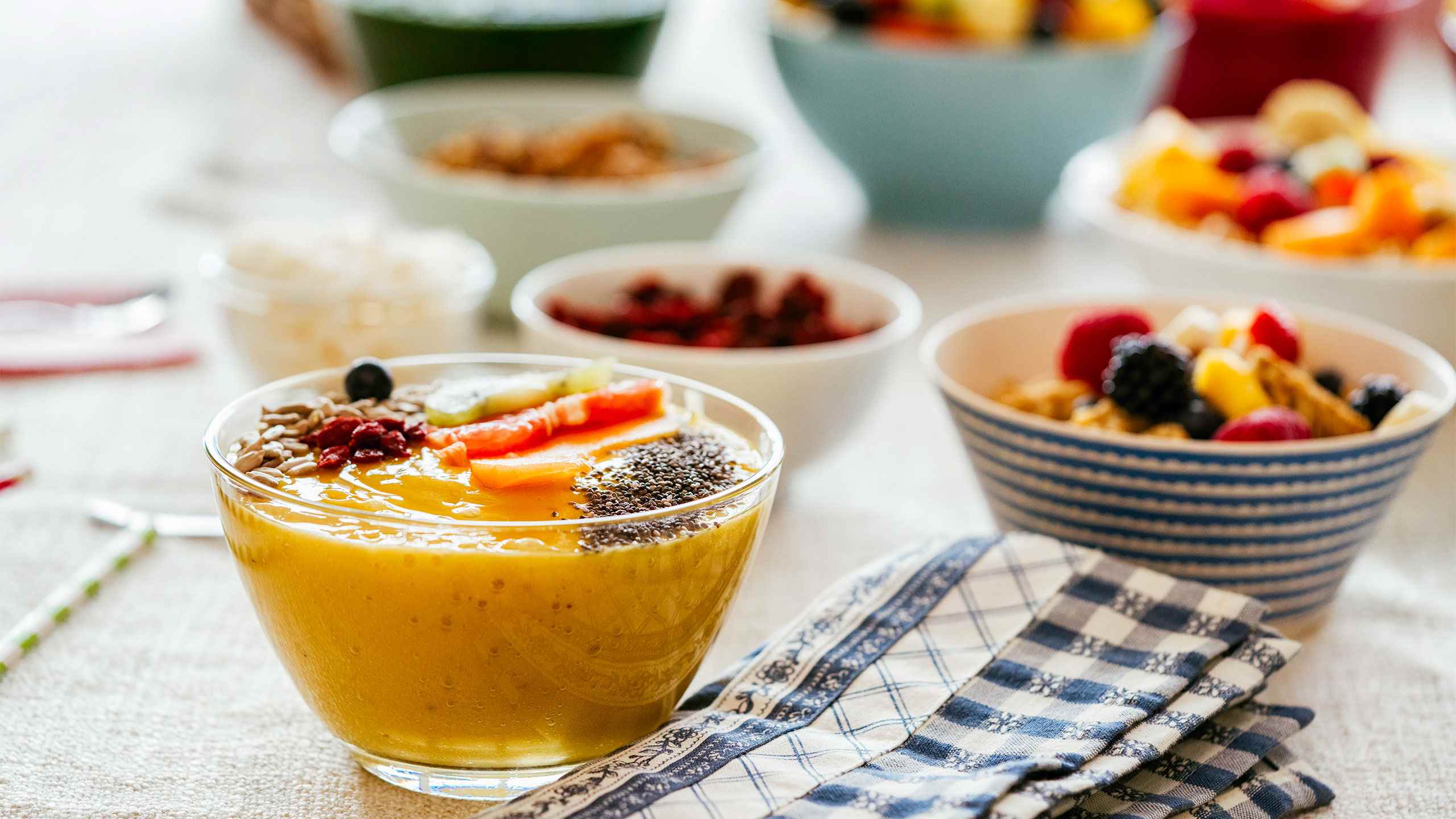 Raspberry-peach-mango smoothie bowl