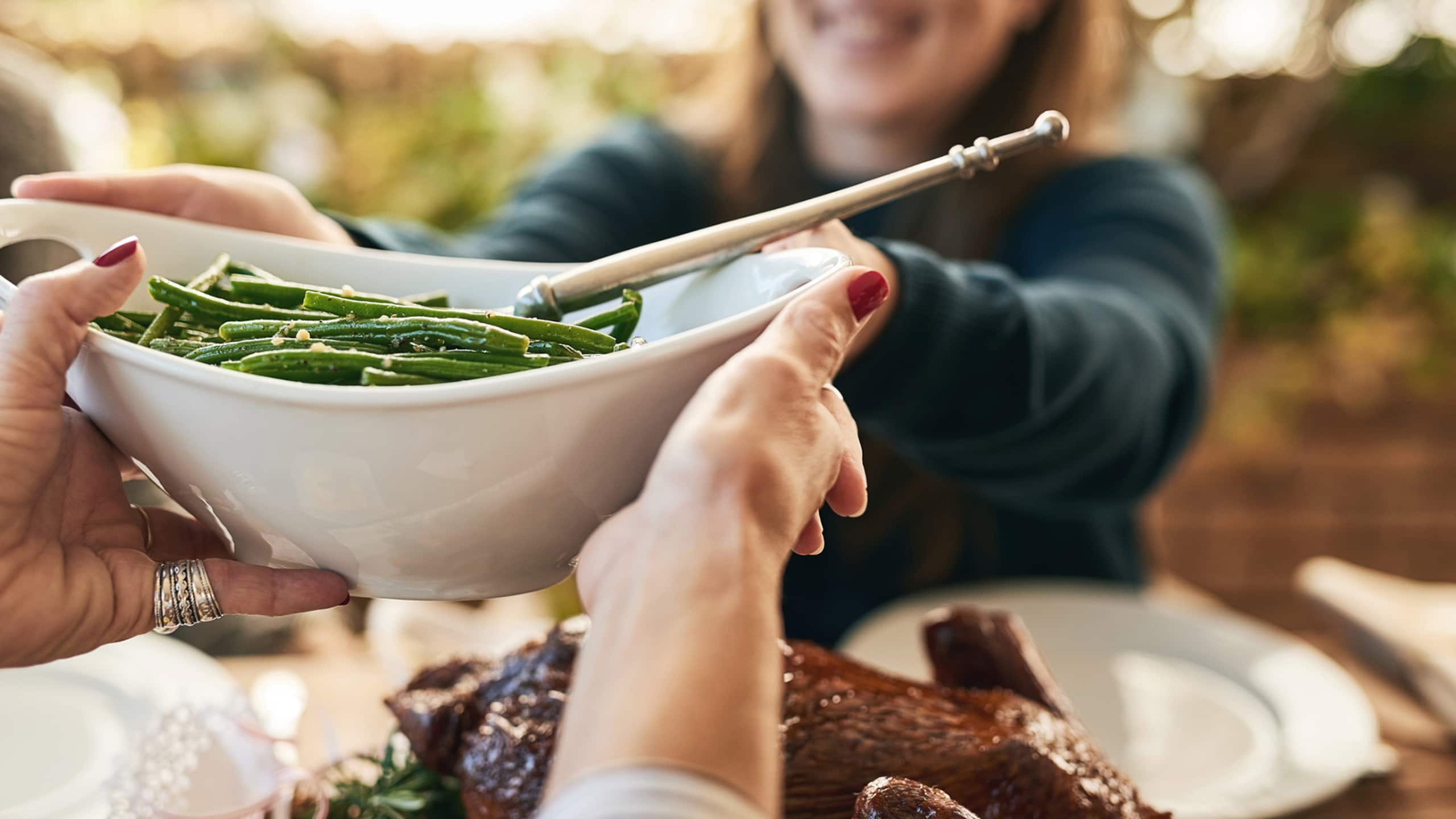 Eat at the table but leave serving plates in the kitchen