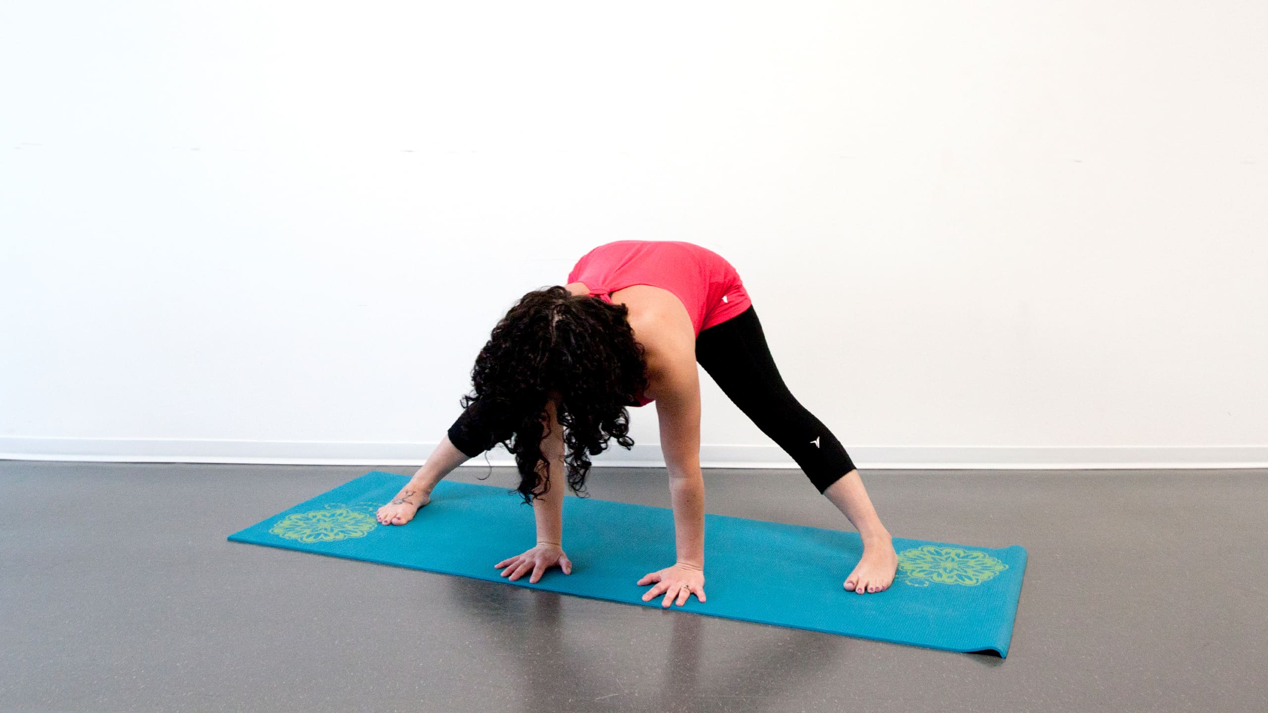 Wide-legged forward fold (prasarita padottanasana)