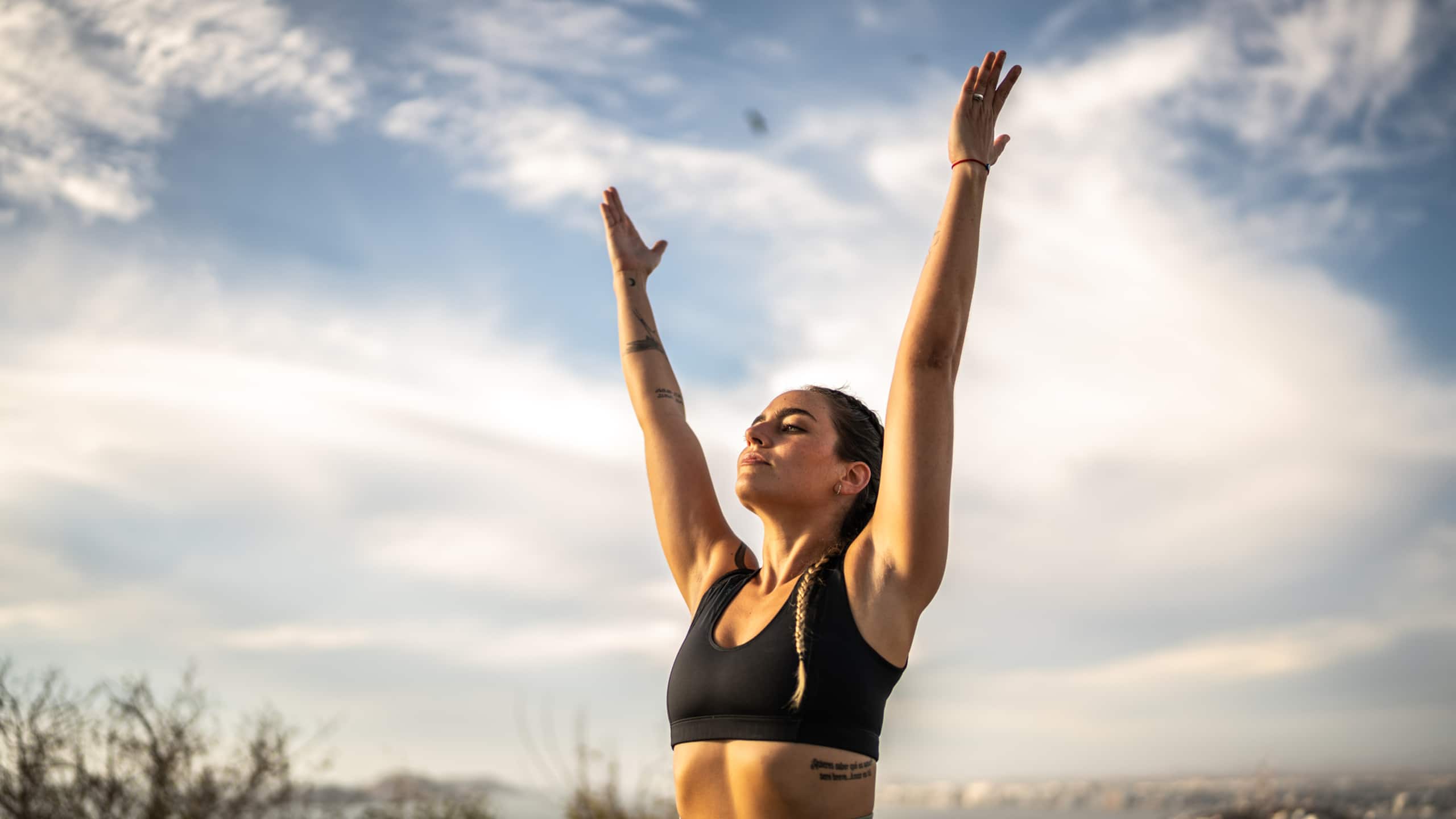 Raised arms pose