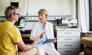 What prevents people from receiving treatment for AMD?