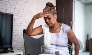 What is agitation in Alzheimer’s disease?