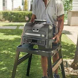 Barbacoa eléctrica XL con ahumador Ninja Woodfire PRO XL (Incluye sensor digital) OG850EU (Pack con mesa y funda) product photo Side New M