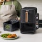 Friggitrice ad aria Ninja Double Stack XL da 9,5 L SL400EUDBCP | Edizione limitata con finiture in rame e accessori in regalo product photo Side New S