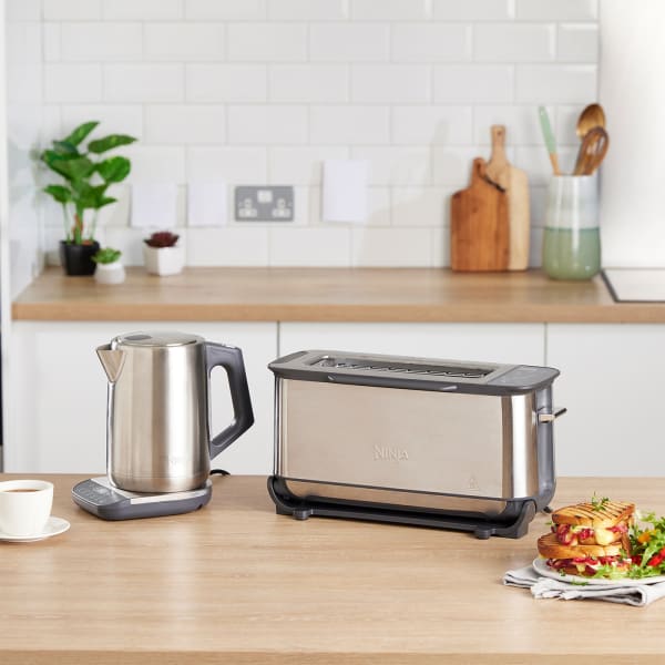 Chrome kettle toaster and microwave outlet
