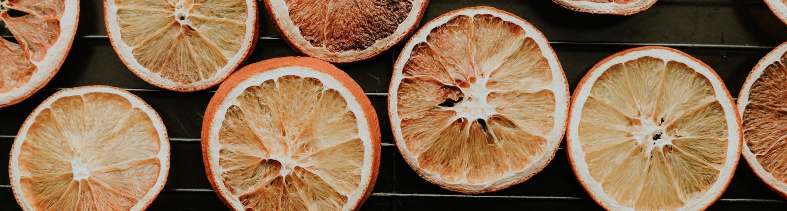 Dehydrated orange slices on rack