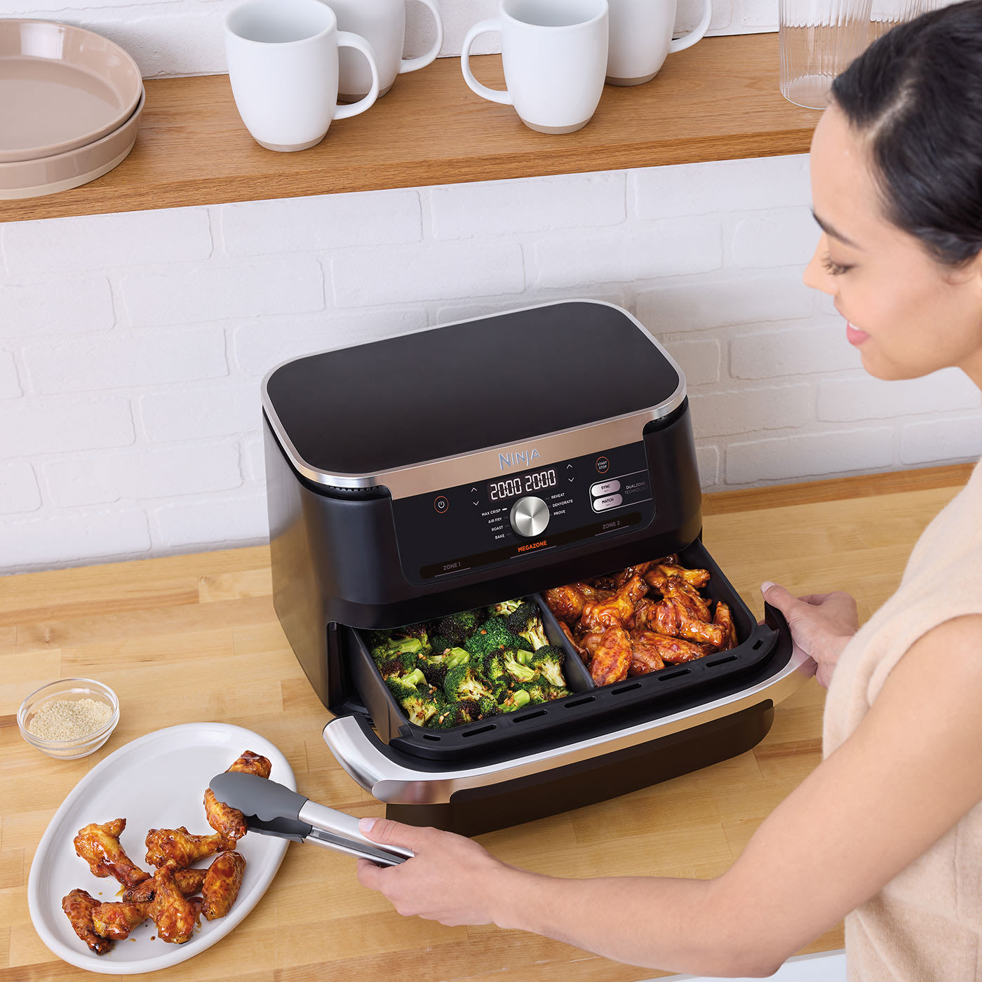 Ninja Foodi FlexDrawer Air Fryer Revolutionizing Meal Prep With Dual   Ninja AF500UK InUse Kitchen Counter SmartFinish Wings Broccoli Woman UK 