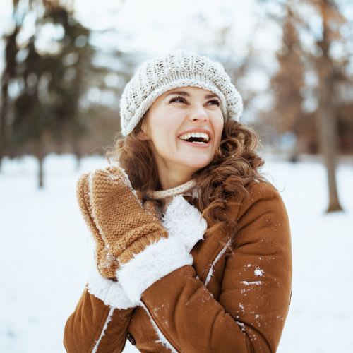 A winter walk with curly hair under hat