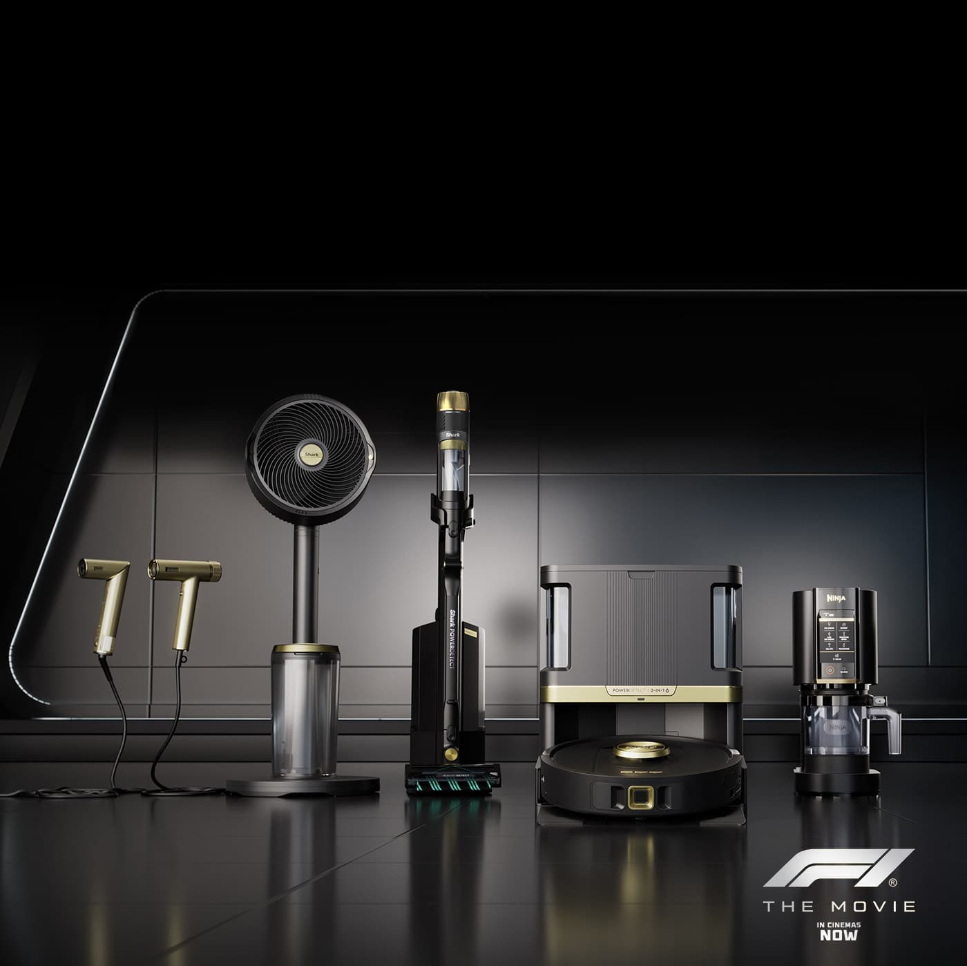 Shark and Ninja limited edition APXGP Collection of home appliances, including a fan, hair dryers, cordless vacuum, robot vacuum, and coffee machine, displayed on a sleek black background with F1 The Movie logo