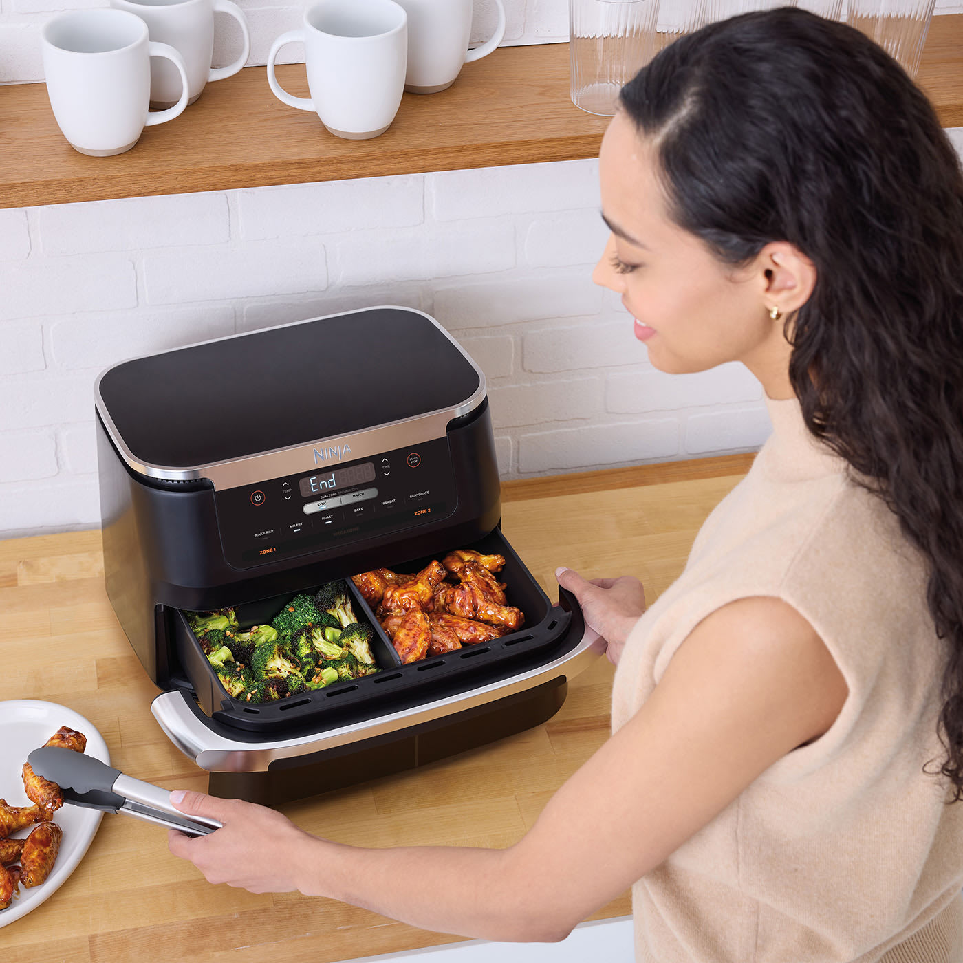 Cuisinez dans 2 zones de cuisson indépendantes…
