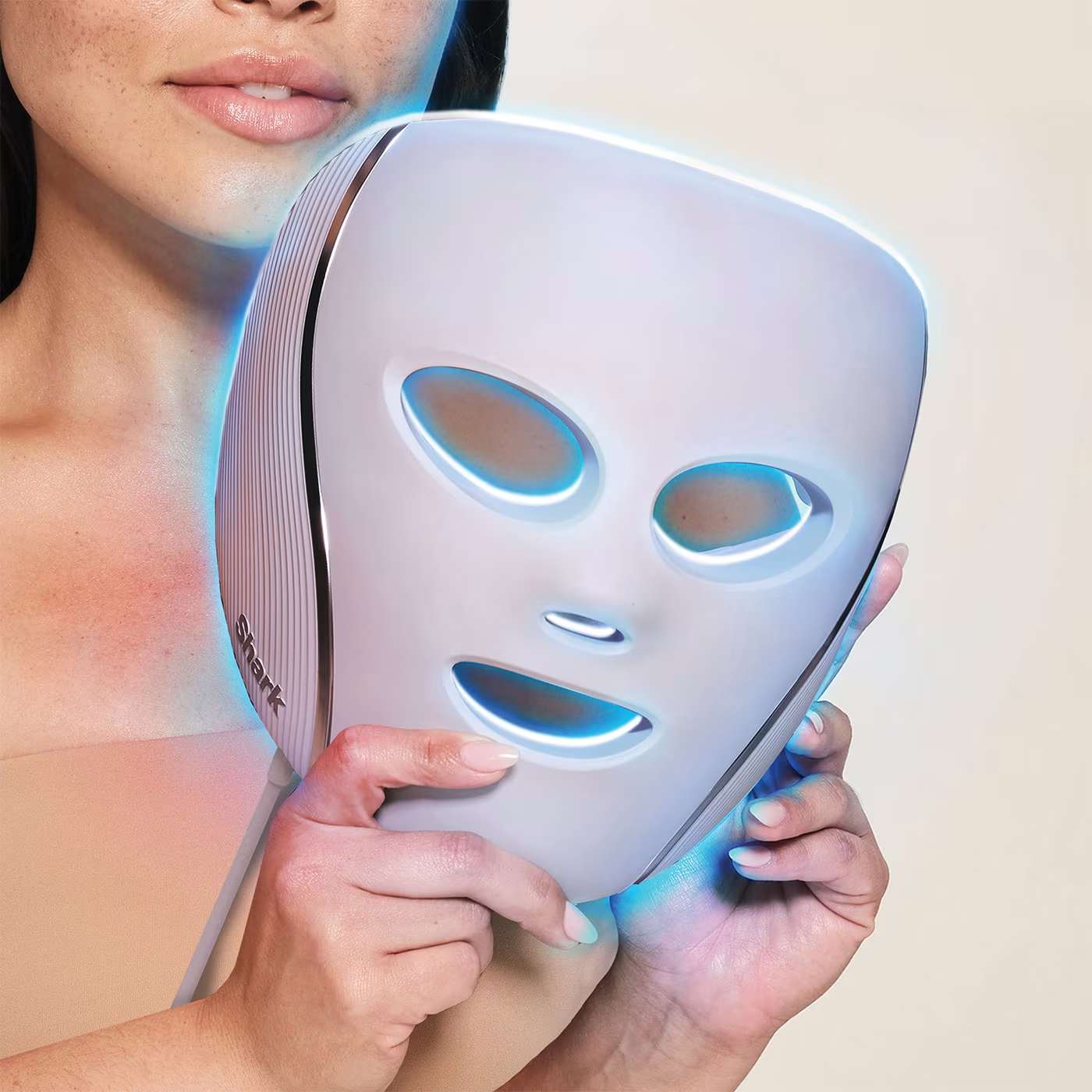 Women using the the Shark FacialPro Glow at home facial system