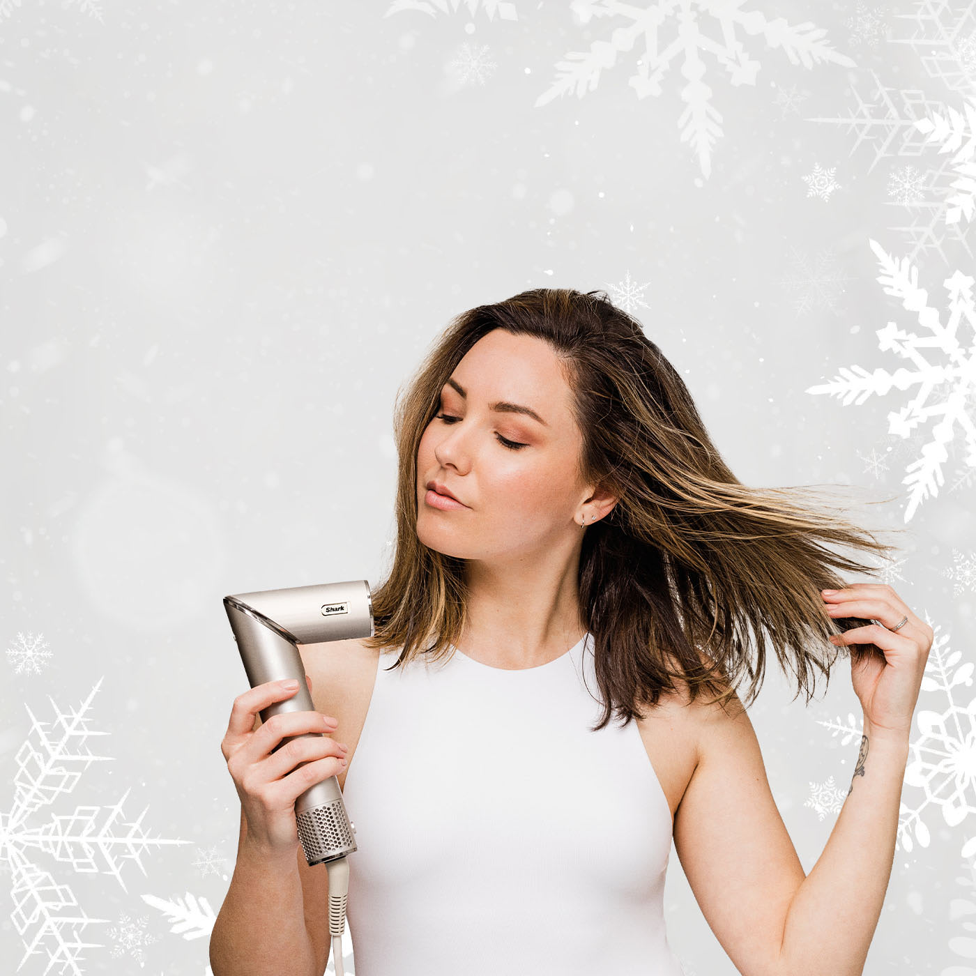 Shark robot simultaneously mopping and vacuuming a tiled floor.