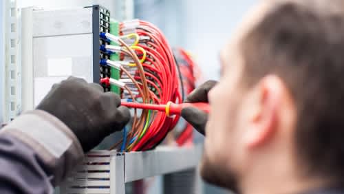 Electrician Servicing Components