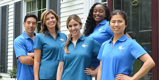 A Senior Home Care by Angels caregiver comforting an elderly woman with Alzheimer's, highlighting compassionate support in a peaceful home setting.