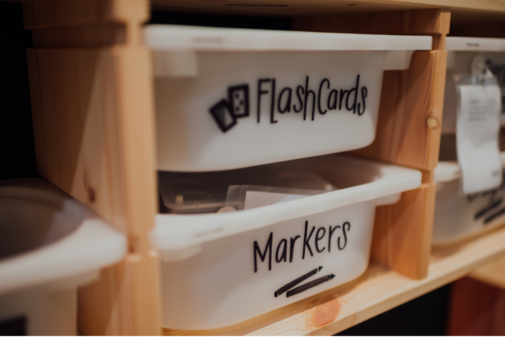 Plastic bins in wood cubby for storage ideas for small spaces