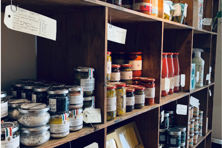 Spice Rack organizer with assorted bottles