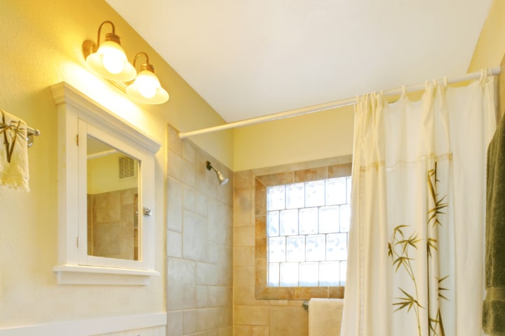 The light is reflected in the mirror for more effect for small bathroom remodel ideas