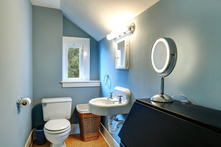 This room doesn’t feel as cramped as it is because of the illusion of height for small bathroom remodel ideas