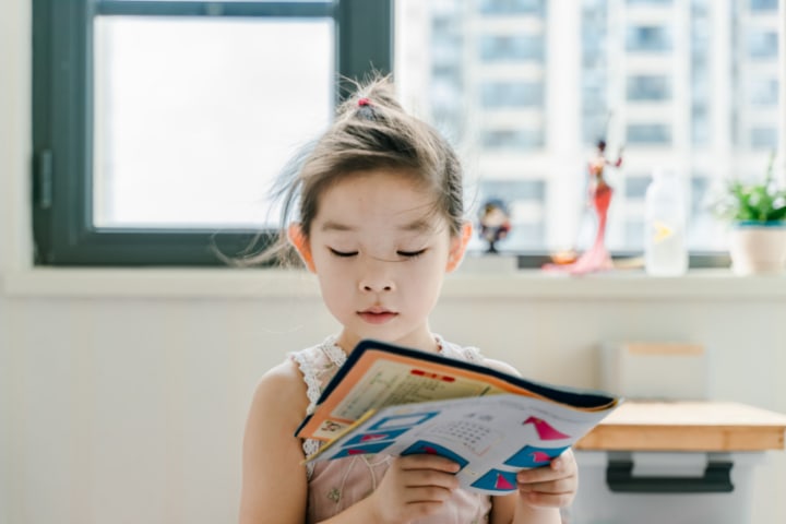 Young girl reading.