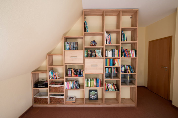 Floor-to-ceiling wood corner shelves