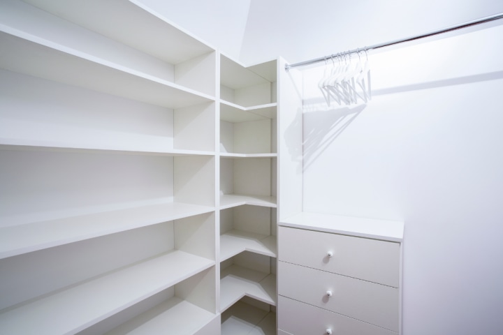 Light-colored reach-in closet.