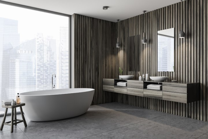 Modern, natural wood finish vanity with drawers and surface sinks.